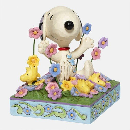 Snoopy in bed of Flowers Figurine (Snoopy) - Gallery Gifts Online 