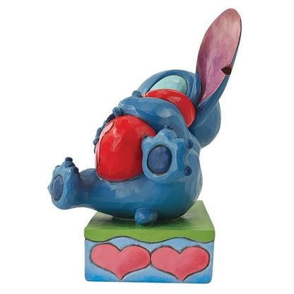 Stitch Hugging a Heart (Disney Traditions by Jim Shore)