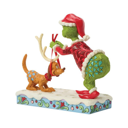 The Grinch Tying Antlers on Max (Jim Shore)