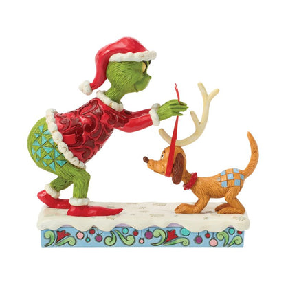 The Grinch Tying Antlers on Max (Jim Shore)